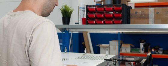 Hydros Power engineer assembling STELION Booster Station during series production